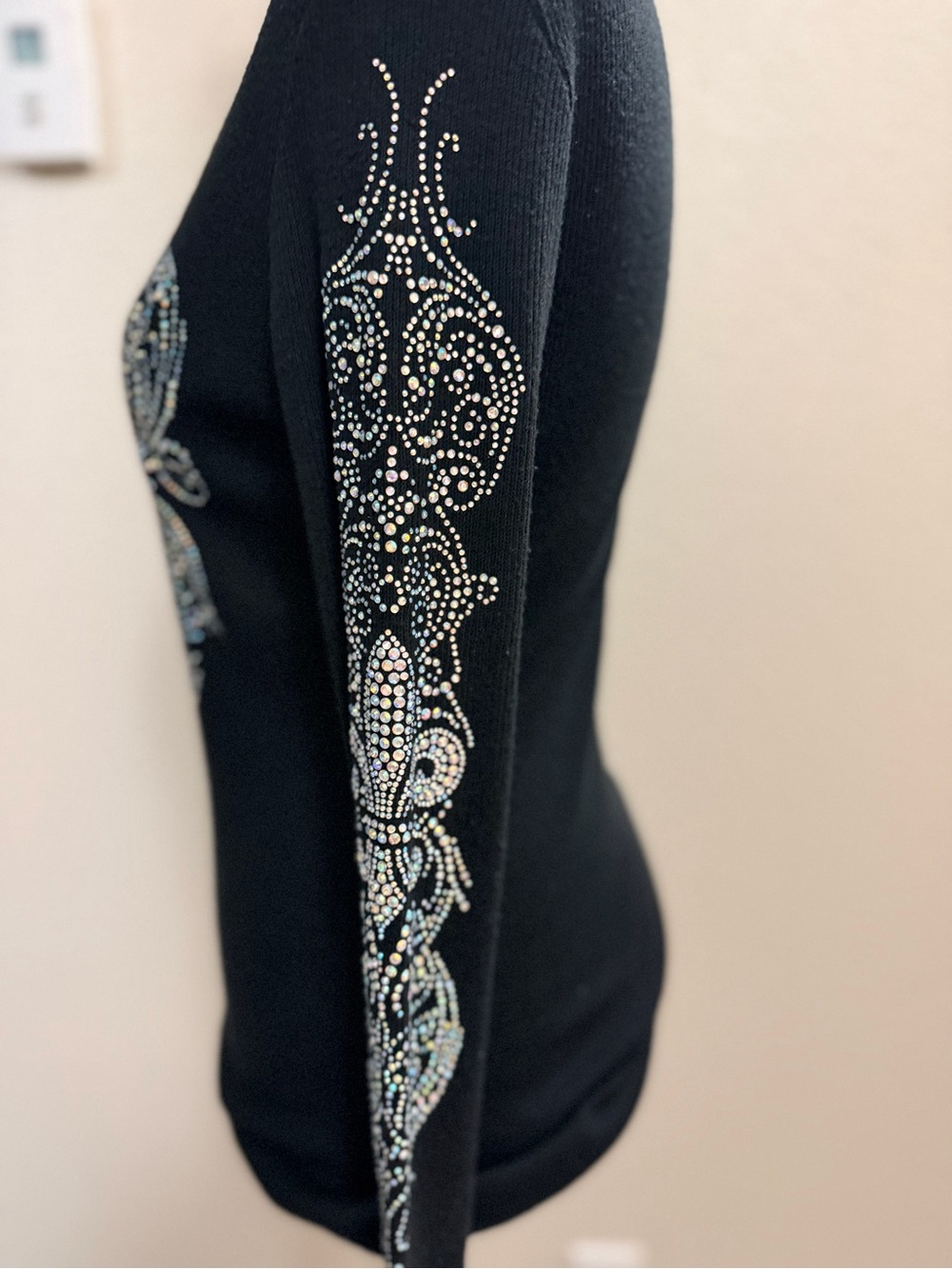 Vocal Black V-Neck Sweater with Rhinestone Fleur-de-Lis Accent - Picture 3 of 7